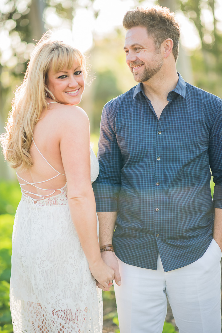 Couple sharing a relaxed portrait in warm natural light
